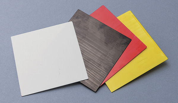 2 Samples of the beetle-inspired ceramic radiative coating in different colors. Photos: City University of Hong Kong.