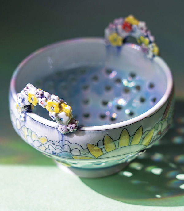 2 Laurie Caffery’s Unicorn Flower Berry Bowl, 6 in. (15.2 cm) in width, wheel-thrown and altered porcelain, handbuilt attachments, inlaid and painted underglaze, fired in oxidation to cone 6.