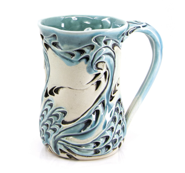 1 Lora Rust’s mug, 7 in. (17.8 cm) in height, wheel-thrown and altered porcelain, various glazes, soda fired to cone 7. Photo: Silvia Palmer.