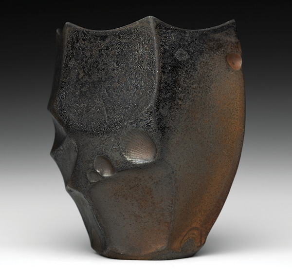 1 Alex Olson’s yunomi, 4¹⁄₅ in. (10.7 cm) in height, wheel-thrown and altered iron-rich stoneware, Cedar Heights Red Art flashing slip, wood fired to cone 9–10, reduction cooled, 2023.