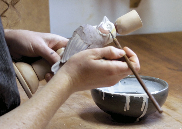 15 Apply underglaze to the bird in built up layers.