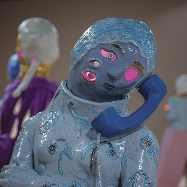 8 Emily Counts' On Hold (detail), 5 ft. (1.5 m) in height, glazed stoneware, gold luster, plexiglass, metallic rope, lighting components, 2023.