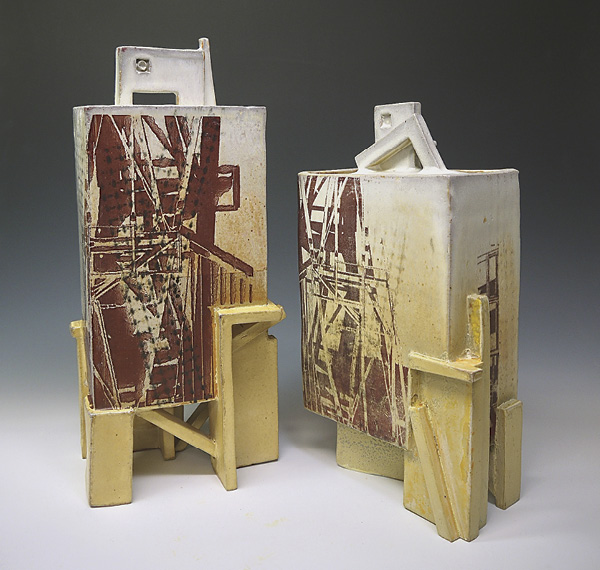 1 Michael Poness’ Shadow City, 13 in. (33 cm) in height, wheel-thrown and altered stoneware with handbuilt sections, flashing slips, glaze, soda fired to cone 10, decals, 2024.