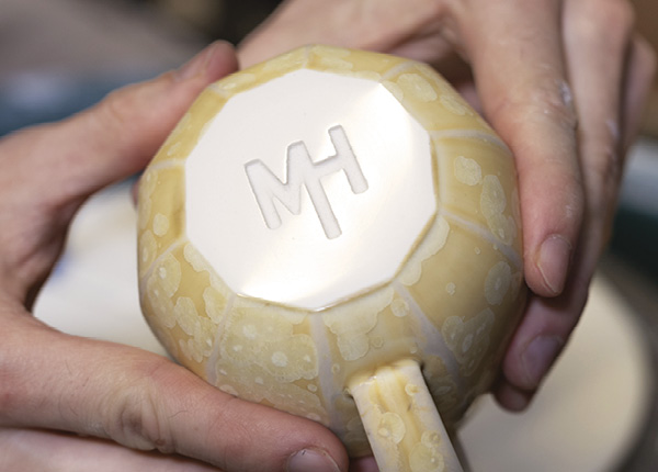 5 Once the marker lines are gone, switch to finer and finer grit diamond pads to achieve a glass-like finish.