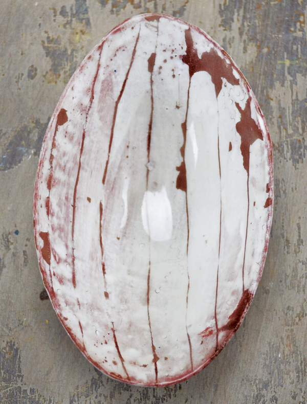 6 Apply a clear glaze over the flaked surface to seal it and create a food-safe surface.