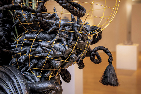 7 Misty Gamble's Ayam Cemani, 4 ft. 2 in. (1.3 m) in height, ceramic, metal, faux flora, synthetic hair, 2023. Photo: Rolando Santos