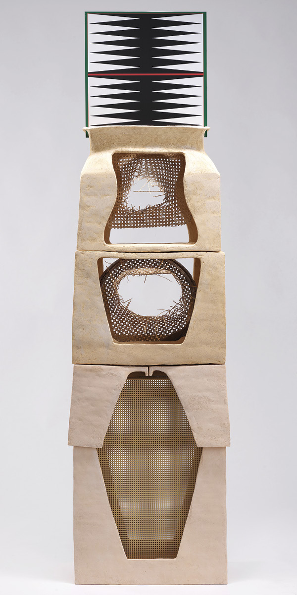 2 Sahar Khoury’s Untitled (rattan tower of fates/tawla), 7 ft. 11/2 in. (2.2 m) in height, cold-waxed ceramic, steel, rattan, wood, aluminum, 2023. Commissioned by the Wexner Center for the Arts. Courtesy of the artist and Rebecca Camacho Presents.