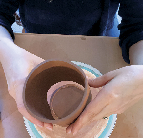 3 Attach the mug body to base using slip.