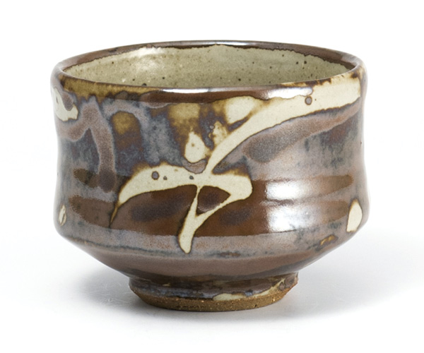 7 Footed bowl, 5 in. (13 cm) in width, stoneware, wax-resist pattern, river iron over glaze.
