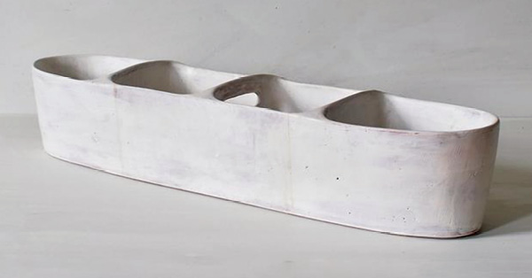 1 Maggie Jaszczak’s Small Partitioned Trough, 24½ in. (62.2 cm) in length, earthenware, slip, glaze, 2023.