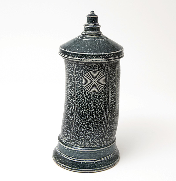2 Walter Keeler's Serpentine Extruded Jar, 11¾ in. (30 cm) in height, stoneware, black stain, salt glaze, oil fired to cone 6–10, 2017. Photo: Goldmark Gallery.