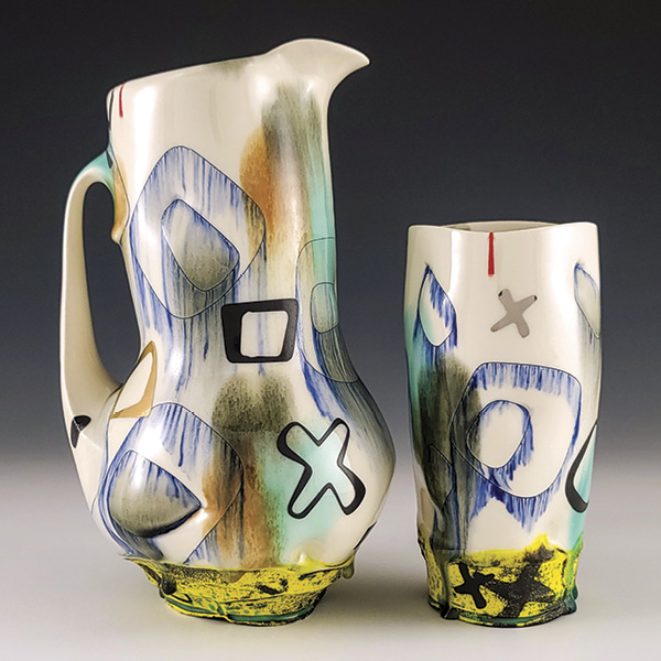 1 Ray Brown’s pitcher and tumbler, to 10¼ in. (26 cm) in height, porcelain, glaze, underglaze, decal, luster, fired to cone 6, 2025. Photo: Companion Gallery.
