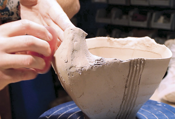 18 As you are building up the neck, make sure to take time to refine the exterior using a combination of a small-toothed metal rib, a regular metal rib, and a soft silicone rib.