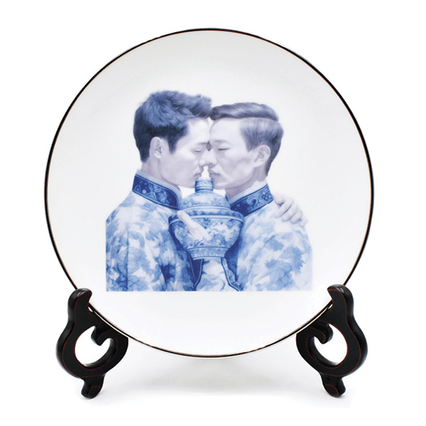 6 Adam Chau’s Generated Love, 8 in. (20 cm) in height, porcelain blank with silver rim, AI-generated decal, wood stand, 2023.