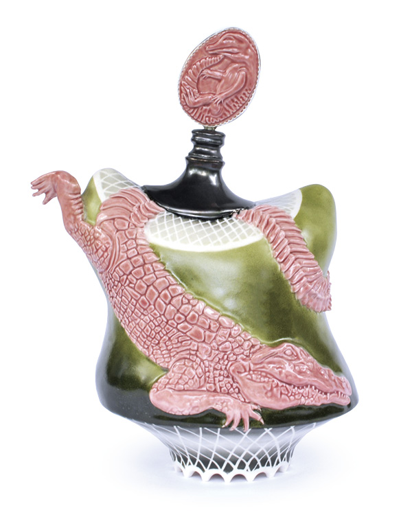 7 Isys Hennigar’s N’en Parlons Plus (Let’s Not Talk About it Anymore), 12 in. (30 cm) in height, porcelain, glaze, overglaze, fired to cone 6 in oxidation, ceramic decals, nickel, sterling silver, 2023.