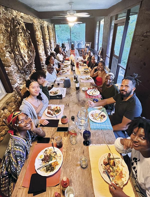 2 The Cookout residents and friends celebrating Juneteenth with a potluck dinner. Photo: Addis Alemu.