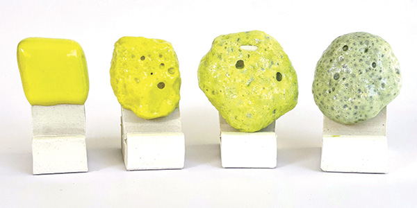 3 These tiles show the same glazes from the previous photo, with the addition of 6% yellow stain. The inclusion of MgSO₄ drastically counteracts the graying effect of the silicon carbide and allows the stain to show.