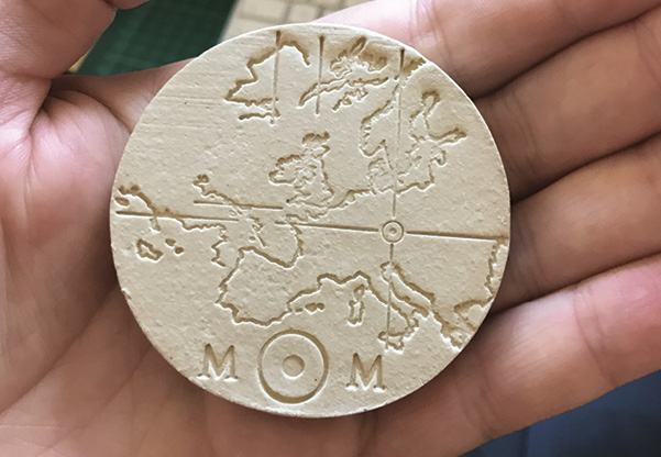 An example of the ceramic tokens that will contain a map to the Memory of Mankind archive. Photo: Memory of Mankind.