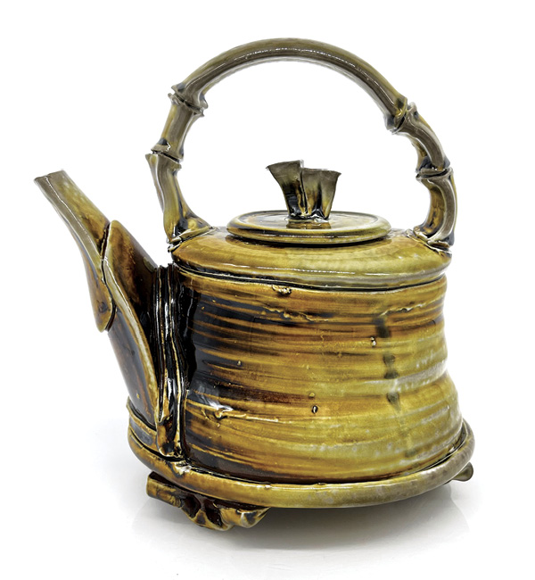 2 William McKinney’s Golden Teapot, 8½ in. (22 cm) in height, soda-fired porcelain, 2023.