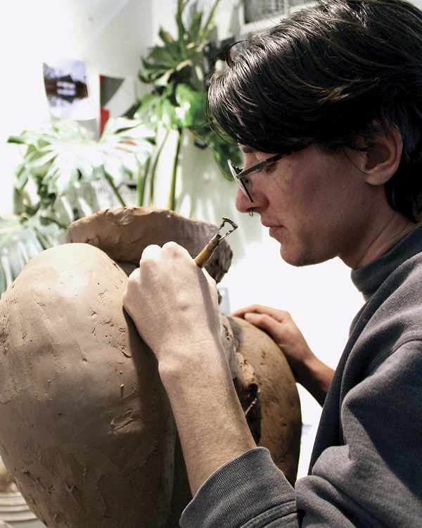 Long Term Resident Artist Yve Holtzclaw (2024–2026) working on a piece in their studio. The Clay Studio of Missoula, Missoula, Montana.