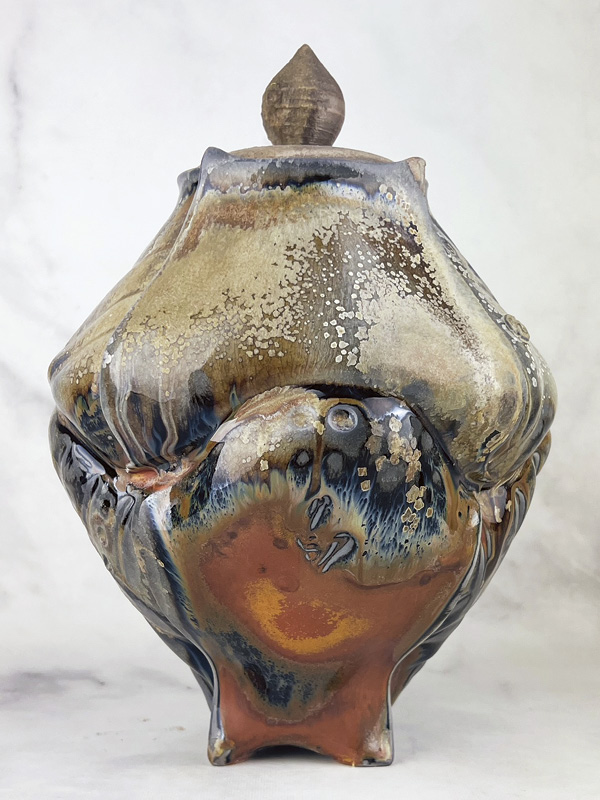 3 Samuel Newman’s Titanium Magic Jar, 8 in. (20.3 cm) in height, White Rose Porcelain, fired for 108 hours in the Pleasant Hill Pottery Anagama, 2024.