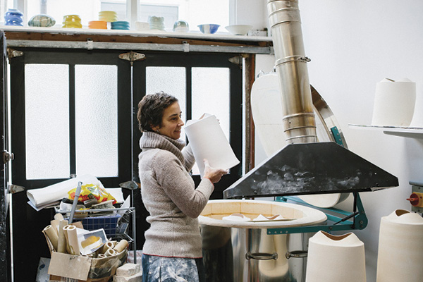 7 Gomez loading bisque ware. Photo: Sarah Weald.
