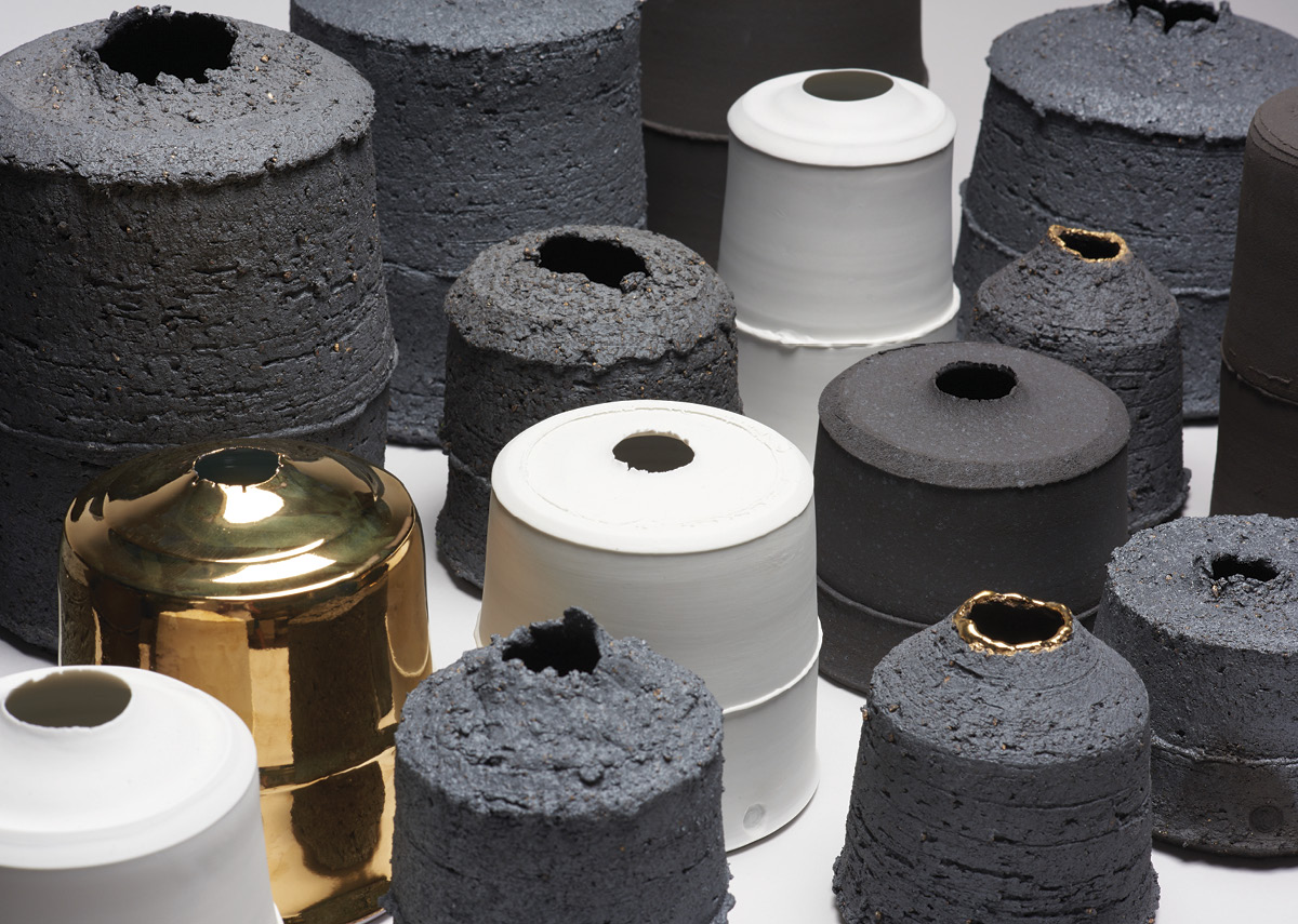 8 Light to Dark, Monochrome Collection, porcelain and black clay, wheel thrown, fired in reduction to 2336°F (1280°C), 10% gold luster. Photo: Jonathan Bassett.