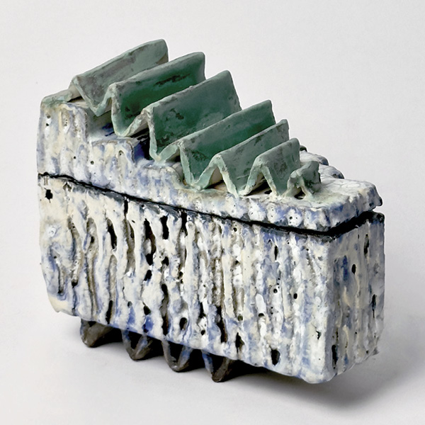 2 Kurinuki Lidded Box, 7 in. (17.8 cm) in length, dark stoneware, porcelain, slips, glazes, 2024.
