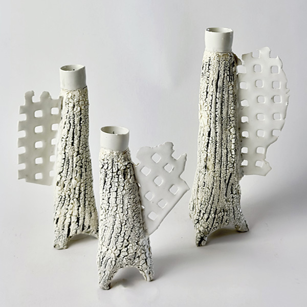 6 Angel Wing Candle Sticks, up to 8 in. (20.3 cm) in height, dark stoneware, porcelain, slips, glazes, nichrome wire, 2025.