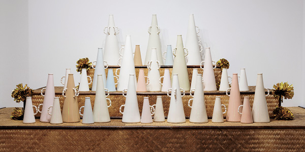 7 Jennifer Ling Datchuk’s like freckles, like eggshells, like stone, to 28 in. (71.1 cm) in height, Kohler Company porcelain, bamboo mats, cheerleader pom poms, bamboo platform, 2022.