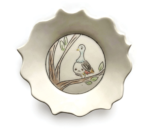 2 Carole Epp’s plate, 9 in. (22.9 cm) in diameter, handbuilt white stoneware, underglazes, glazes, fired to cone 6. Photo: Silvia Palmer.