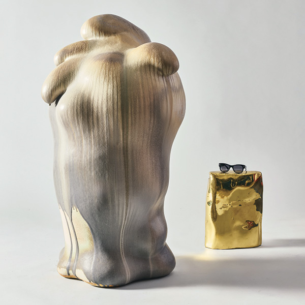 2 Chris Gustin’s Spirit Series #2403, 4 ft. 2 in. (1.3 m) in height, stoneware, glazes, vintage 70s side table, sunglasses, 2024. Photo: Michael Mundy.