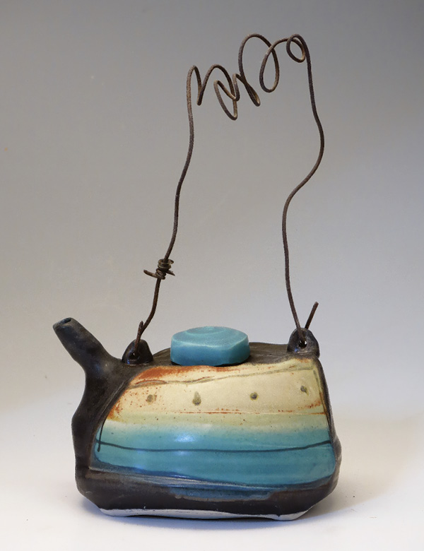 1 Delores Fortuna’s Teapot with Barbed Wire Handle, 13 in. (33 cm) in height, wheel-thrown porcelain, black slip inlay, glazes, fired in reduction to cone 9, 2021.