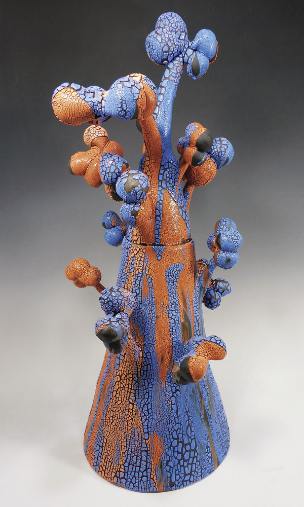 1 Donna Namnoum’s Blue and Orange Tree Jar, 28 in. (71 cm) in height, wheel-thrown and assembled stoneware, underglaze, glaze, fired to cone 5 in an electric kiln, 2024.