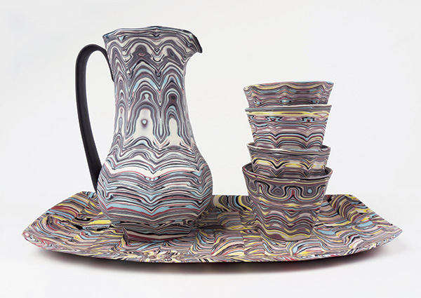 Haakon Lenzi's Agateware cocktail set with pitcher, rocks cups, and tray, 10½ in. (26.7 cm) in height, colored porcelain, glaze, fired in oxidation to cone 8, 2021.