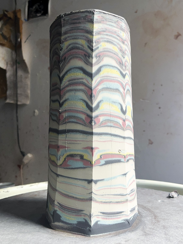 16 Freshly cut eight-sided faceted pot ready to be shaped from the inside.