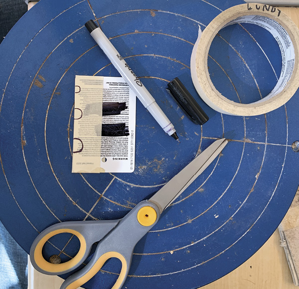 1 Suggested tools: permanent marker, scissors, tape, paintbrush handle, hard-plastic card, and 120-grit sandpaper.