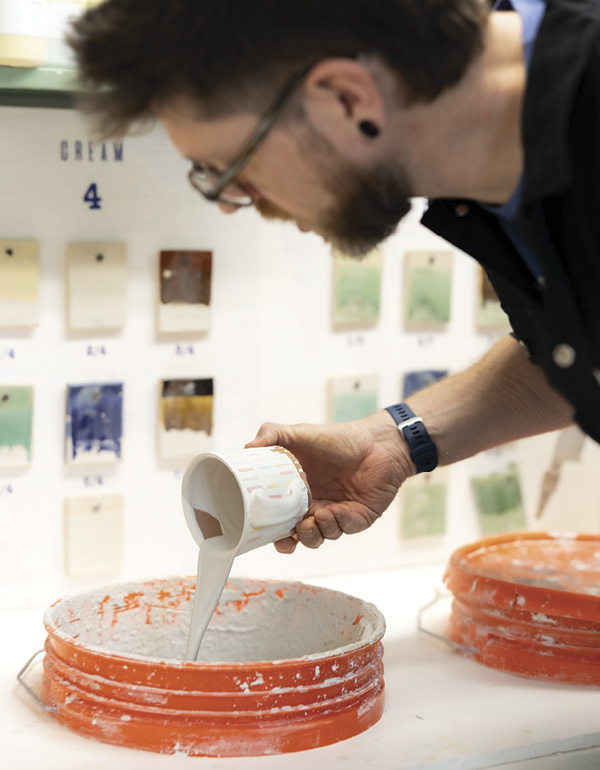 Jeremy Randall working in his studio.
