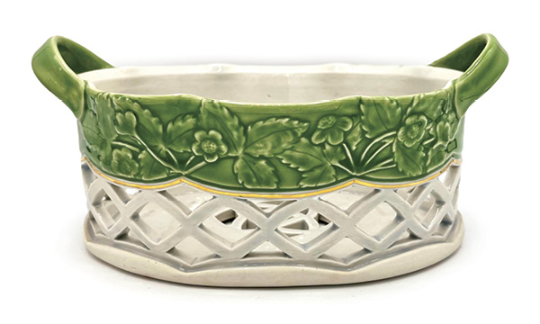 1 Alison Lowery’s Strawberry Basket, 10 in. (25.4 cm) in length, wheel-thrown, handbuilt, and carved porcelain, slip, glaze, gold luster, fired in oxidation.