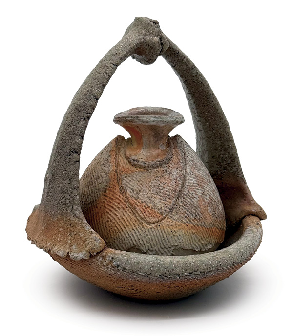 2 Sam McCall’s Bottle Basket, 8 in. (20.3 cm) in height, wheel-thrown and altered stoneware, fired and reduction cooled in a soda kiln.