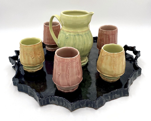 1 Carley Holzem’s pitcher set with tumblers and tray, to 19 in. (48.2 cm) in width, porcelain, fired in oxidation to cone 10, 2026.