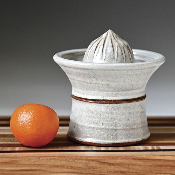 4 Lucy Fagella's Two-piece citrus juicer, wheel-thrown and carved stoneware, glaze, fired and slow cooled in oxidation to cone 6.