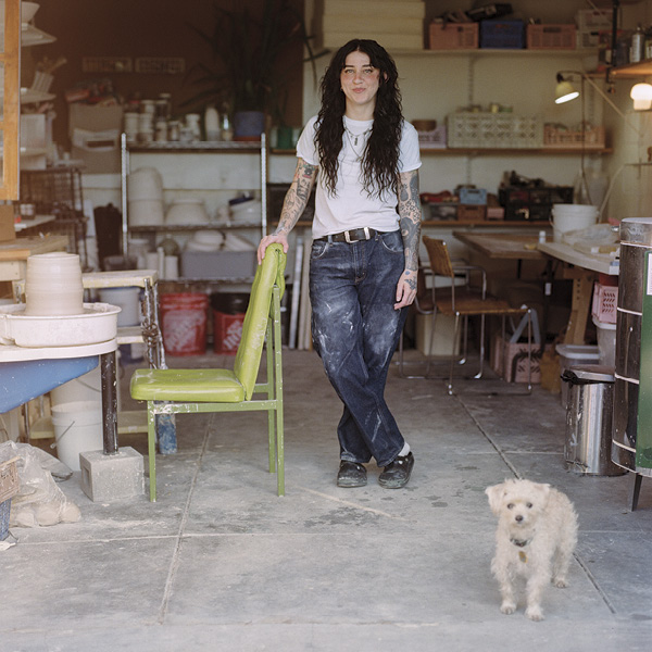 2 Madeline Wheeler (NonPorous Ceramics) in her home studio with her dog, Goldie. Photo: Kris Hayden (@parallelparking).