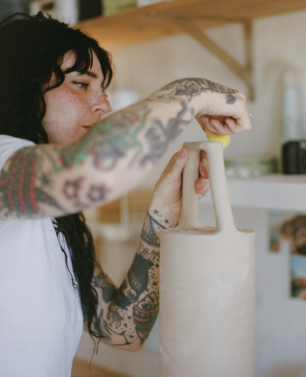 6 Putting the finishing touches on a greenware lamp. 5, 6 Photo: Kris Hayden (@parallelparking).