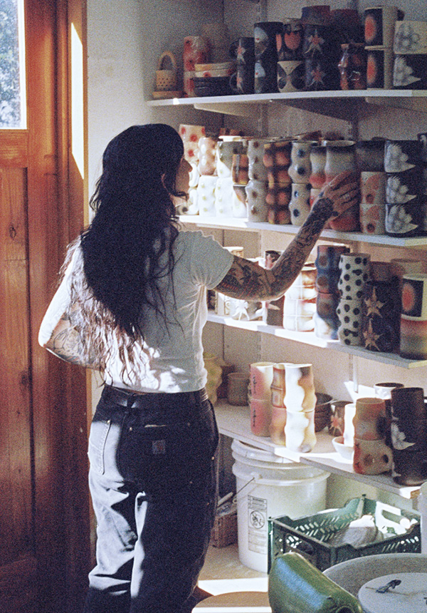 9 Once work has been fired, it is organized and stored on adjustable wall shelves. Photo: Smiles Meyer (@strangeexposures).