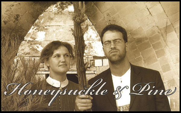 1 “Honeysuckle and Pine” postcard, featuring Naysan McIlhargey and his wife, Jalana. Inspired by Grant Wood’s American Gothic. Photo: Vanessa Graham.