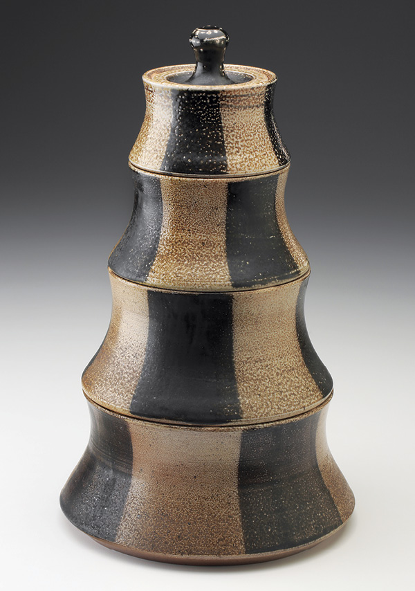9 Stacking canister set (four sections), 14 in. (36 cm) in height, white stoneware, black slip, salt glazed and wood fired to cone 10, 2020.