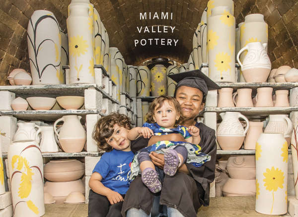 7 Postcard for Miami Valley’s spring sale, featuring the three McIlhargey kids, Emil, Elyse, and Bli. Card design by Kaitlin Meme. Photo: Bill Franz.