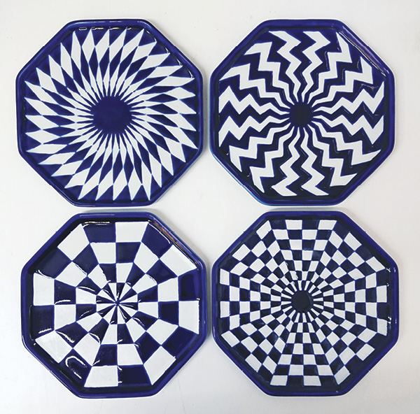 4 8-angled plates, 7 in. (18cm) in diameter, porcelain with wax-resist decoration, 2004–present.