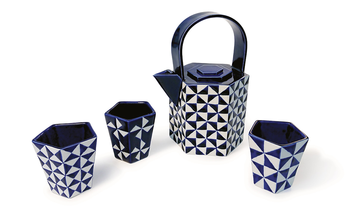7 Teapot and cups, to 8¼ in. (21 cm) in height, porcelain with wax-resist decoration, 2016.